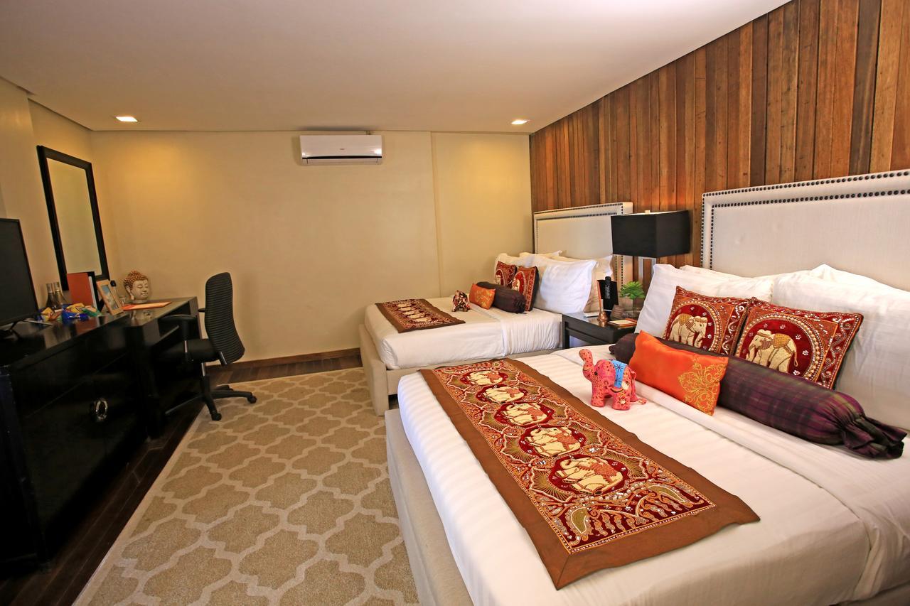 The Oriental Luxury Suites Alfonso Værelse billede